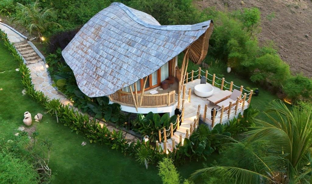 Aerial view of a bamboo bungalow at Green Poya